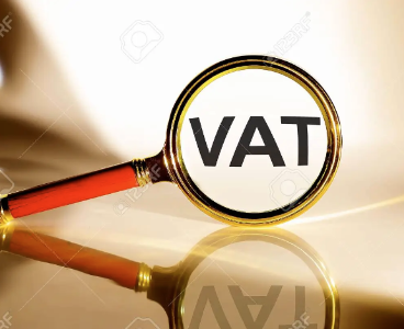 a magnifing glass that reads vat